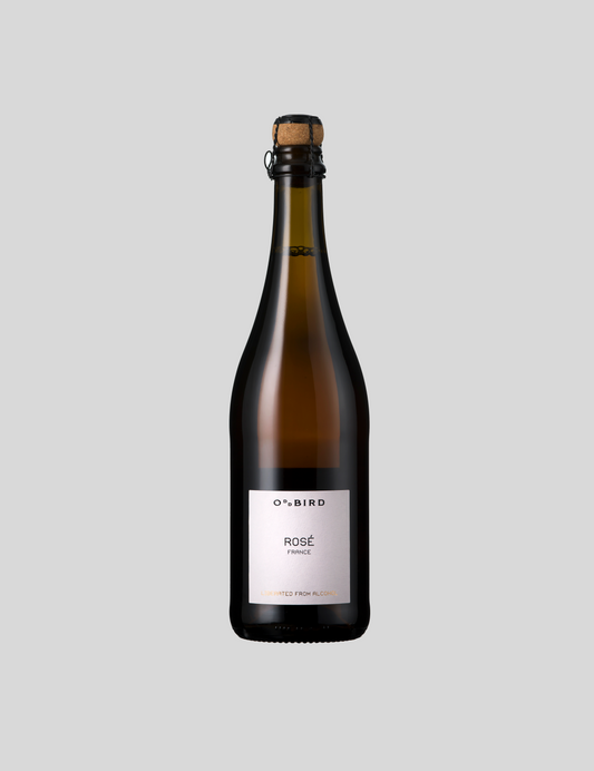 Oddbird nealkoholinis Sparkling Rosé gėrimas ant pilko fono